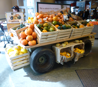 grocery store produce display tables and carts